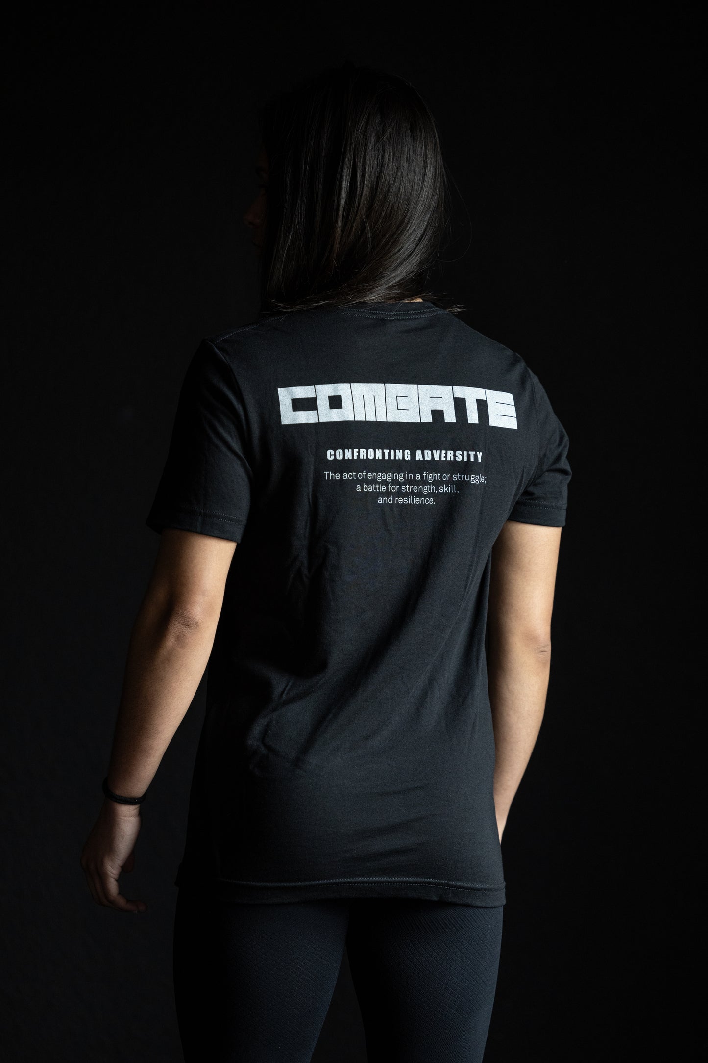 Combate Confronting Adversity Tee