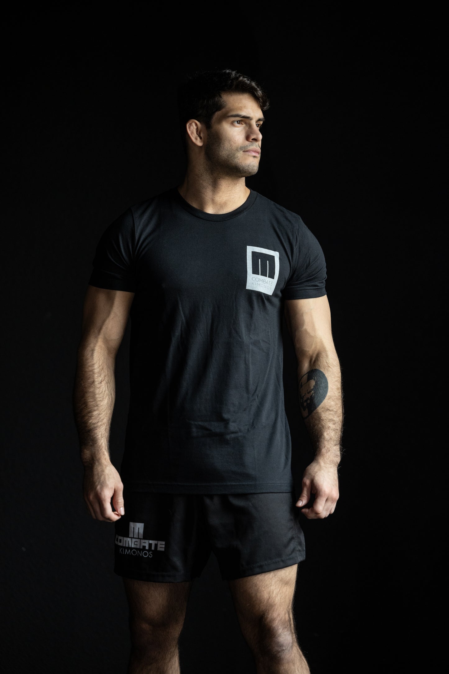 Combate Confronting Adversity Tee