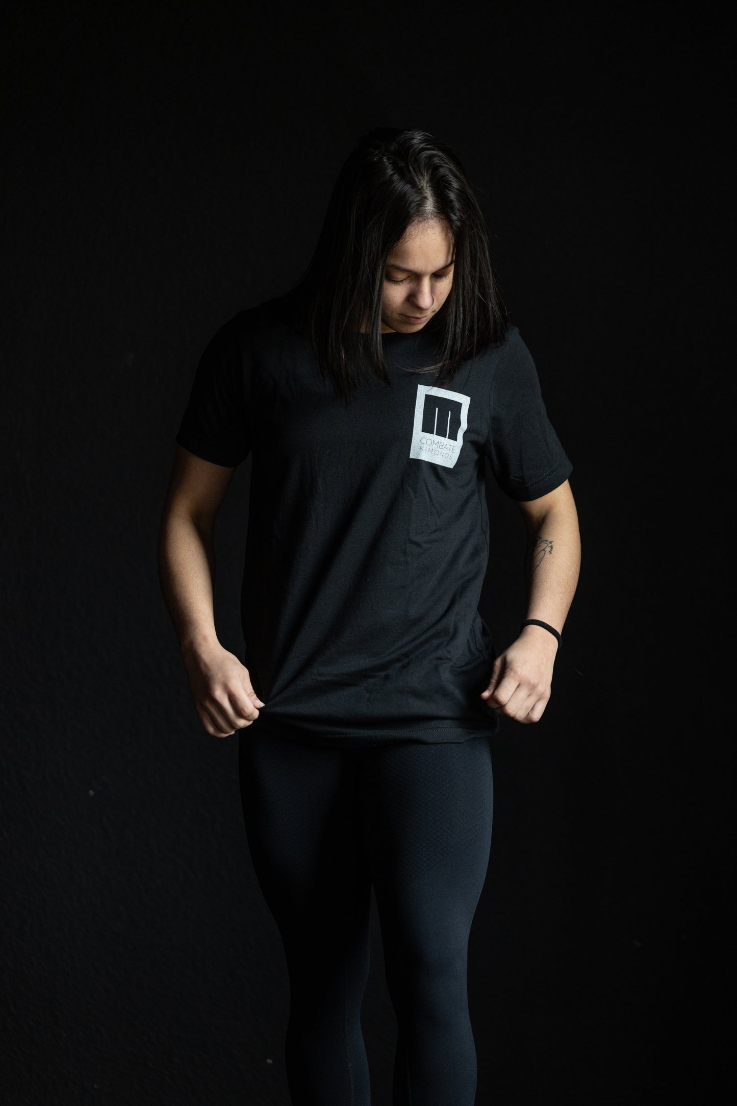 Combate Confronting Adversity Tee