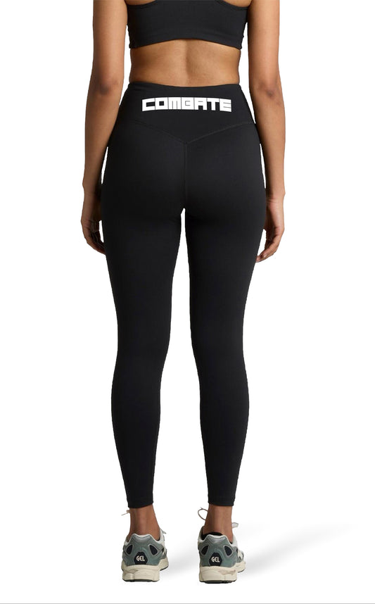 Person wearing black leggings with 'Combate' branding on a white background
