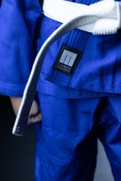 close up of martial arts uniform with tag Combate kimonos
